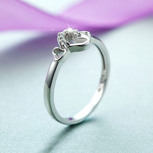 925 Silver Mode Ihåliga Hjärtformade Inläggningar Cubic Zirconia Förlovningsring